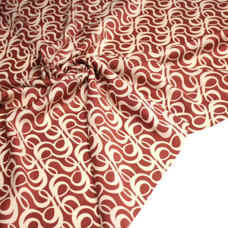 Tissu viscose fluide, motifs et cercles géométriques écrus, fond terre de sienne - tissuspipi.com