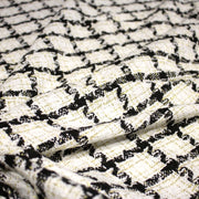 Tissu Tweed blanc cassé, liserés carreaux noirs et dorés lurex - tissuspipi.com