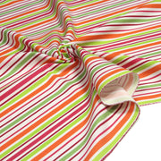Tissu Bayadère de coton aux rayures oranges, rouges et roses, fond blanc - tissuspipi.com