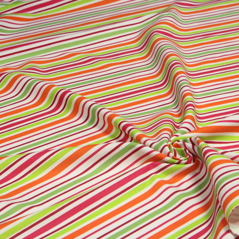 Tissu Bayadère de coton aux rayures oranges, rouges et roses, fond blanc - tissuspipi.com