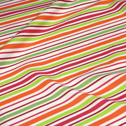 Tissu Bayadère de coton aux rayures oranges, rouges et roses, fond blanc - tissuspipi.com