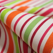 Tissu Bayadère de coton aux rayures oranges, rouges et roses, fond blanc - tissuspipi.com