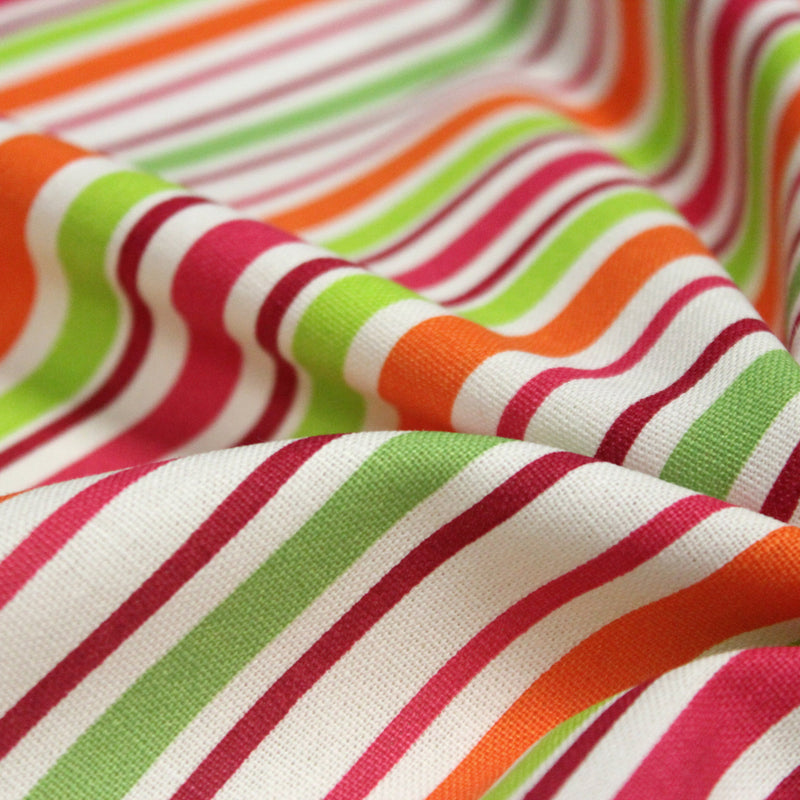 Tissu Bayadère de coton aux rayures oranges, rouges et roses, fond blanc - tissuspipi.com
