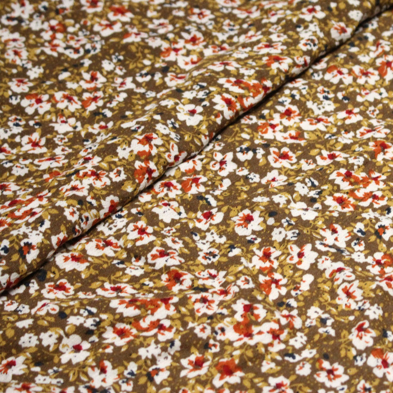 Tissu Viscose crêpe ocre fleuri blanc rouille noir - tissuspipi.com