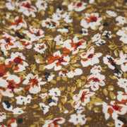 Tissu Viscose crêpe ocre fleuri blanc rouille noir - tissuspipi.com