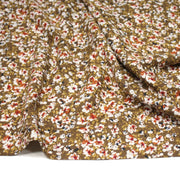 Tissu Viscose crêpe ocre fleuri blanc rouille noir - tissuspipi.com