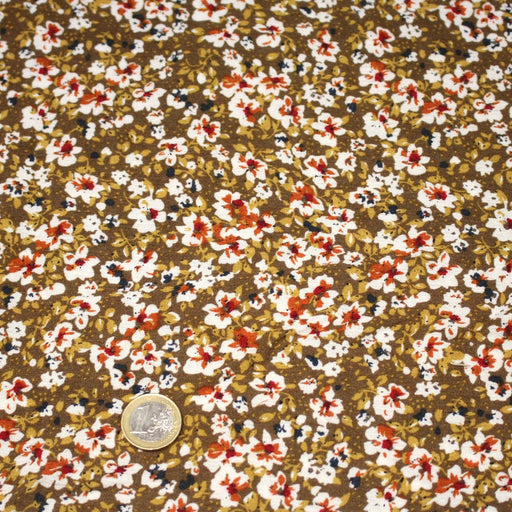 Tissu Viscose crêpe ocre fleuri blanc rouille noir - tissuspipi.com