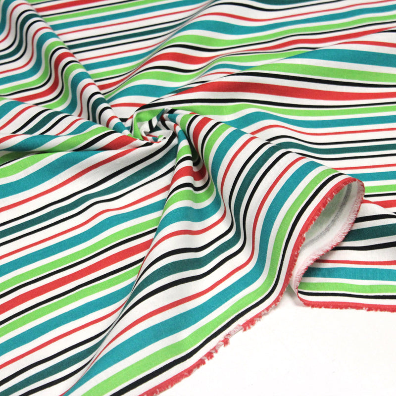 Tissu Bayadère de coton aux rayures vertes, rouges et noires, fond blanc - tissuspipi.com