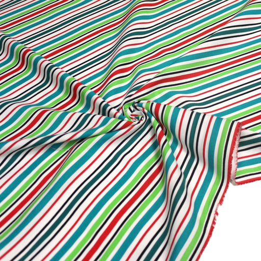 Tissu Bayadère de coton aux rayures vertes, rouges et noires, fond blanc - tissuspipi.com