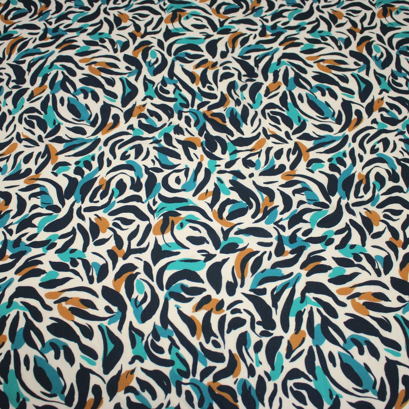 Tissu Viscose fluide au feuillage marine canard et ocre, fond écru - tissuspipi.com