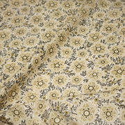 Tissu popeline coton ocre clair aux fleurs & fines arabesques noirs et jaunes - tissuspipi.com