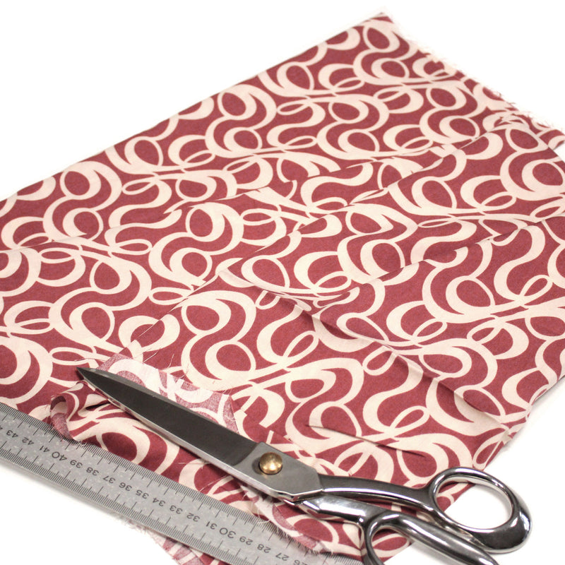 Tissu viscose fluide, motifs et cercles géométriques écrus, fond terre de sienne - tissuspipi.com