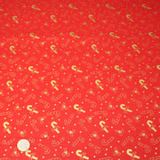Tissu coton NOËL rouge aux houx et sucres d'orge dorés - OEKO - TEX - tissuspipi.com