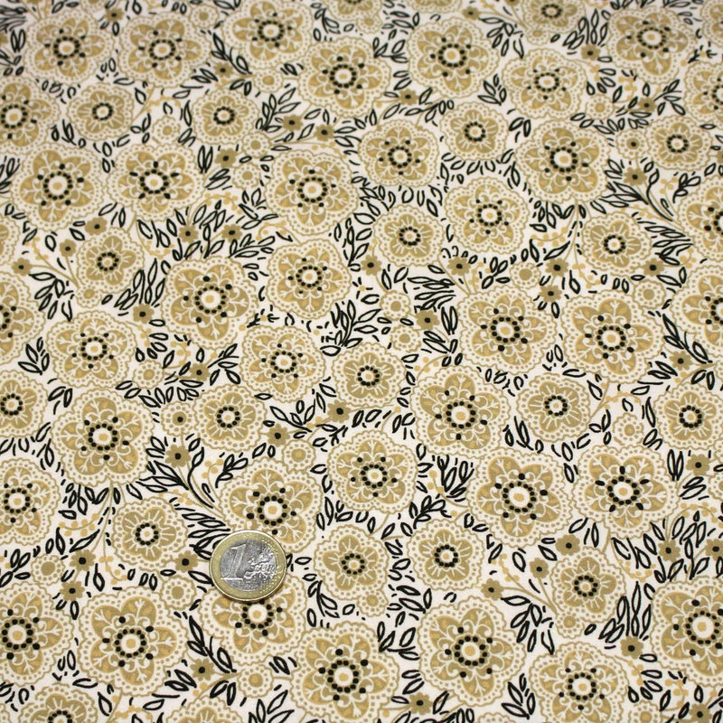 Tissu popeline coton ocre clair aux fleurs & fines arabesques noirs et jaunes - tissuspipi.com