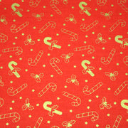 Tissu coton NOËL rouge aux houx et sucres d'orge dorés - OEKO - TEX - tissuspipi.com