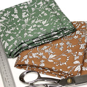 Tissu viscose fluide, fines fleurs blanches et noirs, fond ocre ou fond vert - tissuspipi.com
