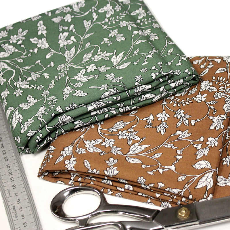 Tissu viscose fluide, fines fleurs blanches et noirs, fond ocre ou fond vert - tissuspipi.com