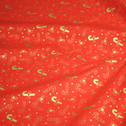Tissu coton NOËL rouge aux houx et sucres d'orge dorés - OEKO - TEX - tissuspipi.com