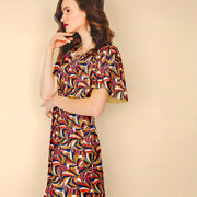 Tissu viscose fluide, motif floral & toucans : tons prune ou tons marine - OEKO - TEX STANDARD 100 - tissuspipi.com