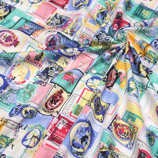 Tissu popeline coton Timbres britanniques multicolores - tissuspipi.com