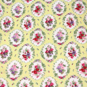 Tissu popeline jaune aux macarons fleuris britanniques - tissuspipi.com