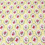 Tissu popeline jaune aux macarons fleuris britanniques - tissuspipi.com