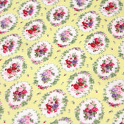 Tissu popeline jaune aux macarons fleuris britanniques - tissuspipi.com