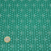 Tissu popeline de coton JADE, faux - uni aux fleurs vertes - tissuspipi.com