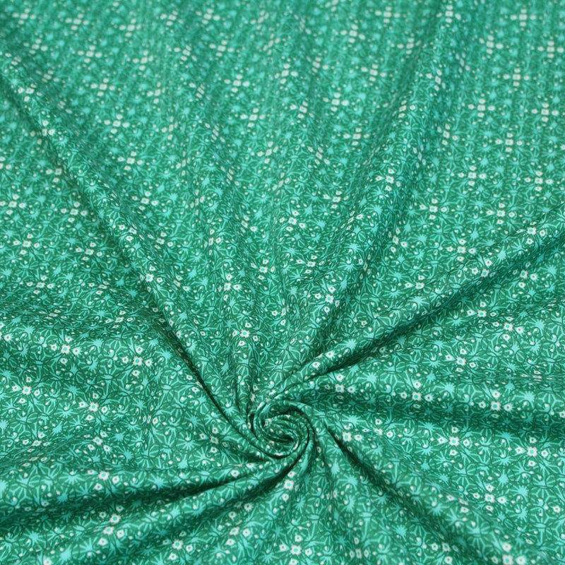 Tissu popeline de coton JADE, faux - uni aux fleurs vertes - tissuspipi.com