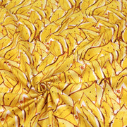 Tissu popeline de coton SUMATRA au feuillage tropical jaune, fond blanc - tissuspipi.com