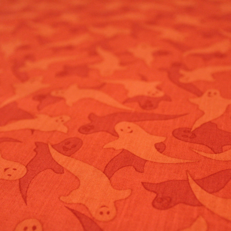 Tissu popeline de coton aux fantômes orange, fond orange - COLLECTION HALLOWEEN - tissuspipi.com