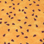 Tissu popeline de coton aux petites coccinelles rouges, fond jaune safran - tissuspipi.com