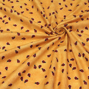 Tissu popeline de coton aux petites coccinelles rouges, fond jaune safran - tissuspipi.com