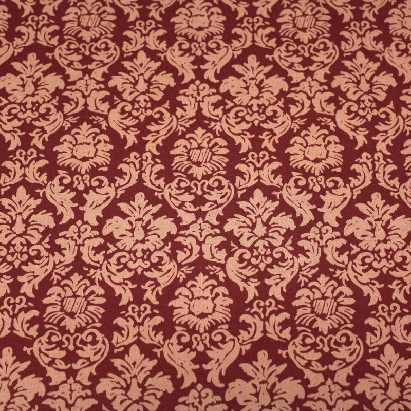 Tissu popeline de coton aux arabesques caramel, fond rouge bordeaux - COLLECTION LOUIS - tissuspipi.com