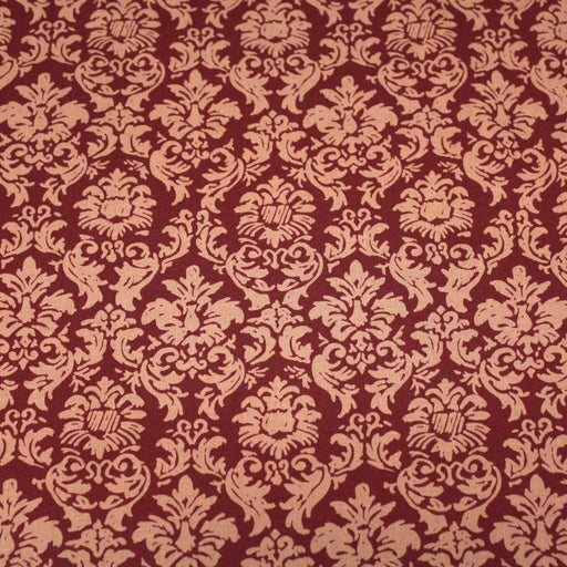 Tissu popeline de coton aux arabesques caramel, fond rouge bordeaux - COLLECTION LOUIS - tissuspipi.com