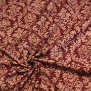 Tissu popeline de coton aux arabesques caramel, fond rouge bordeaux - COLLECTION LOUIS - tissuspipi.com
