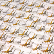 Tissu popeline de coton aux girafes jaunes & baobab, fond blanc - tissuspipi.com