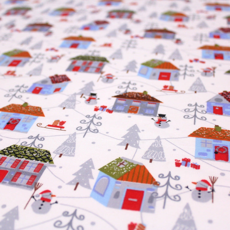 Tissu popeline de coton de Noël aux petites maisons & bonshommes de neige, fond blanc - tissuspipi.com