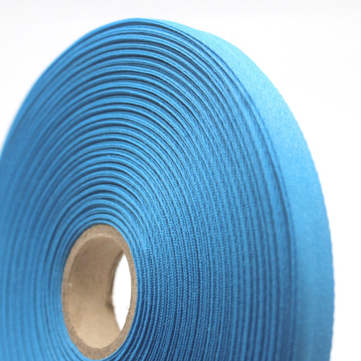 Ruban de sergé bleu turquoise 10mm - Galette de 50 mètres - Fabrication française - tissuspipi.com