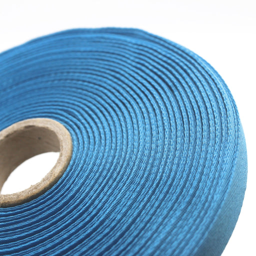 Ruban de sergé bleu turquoise 10mm - Galette de 50 mètres - Fabrication française - tissuspipi.com