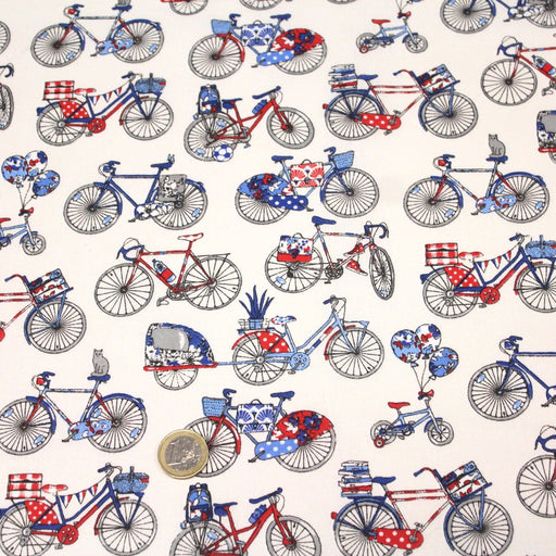 Tissu de coton aux petits vélos tricolores bleus blancs rouges, fond écru - Oeko - Tex - tissuspipi.com
