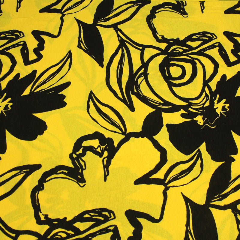 Tissu jersey de viscose jaune aux grandes fleurs noires - COLLECTION ETHNIQUE - tissuspipi.com