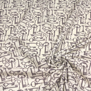 Tissu popeline de coton aux clefs vintage taupe, fond écru - tissuspipi.com