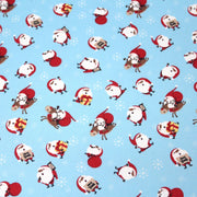 Tissu popeline de coton de Noël - Le père Noël, fond bleu ciel - tissuspipi.com