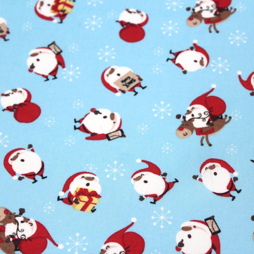 Tissu popeline de coton de Noël - Le père Noël, fond bleu ciel - tissuspipi.com