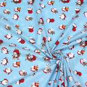 Tissu popeline de coton de Noël - Le père Noël, fond bleu ciel - tissuspipi.com