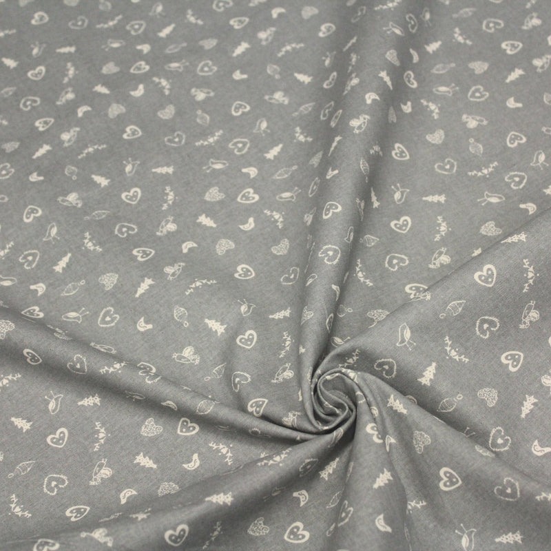 Tissu de coton de Noël scandinave aux petits objets de Noël écrus, fond gris - tissuspipi.com