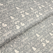 Tissu de coton de Noël scandinave aux cloches & arabesques écrues, fond gris - tissuspipi.com
