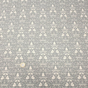 Tissu de coton de Noël scandinave aux cloches & arabesques écrues, fond gris - tissuspipi.com