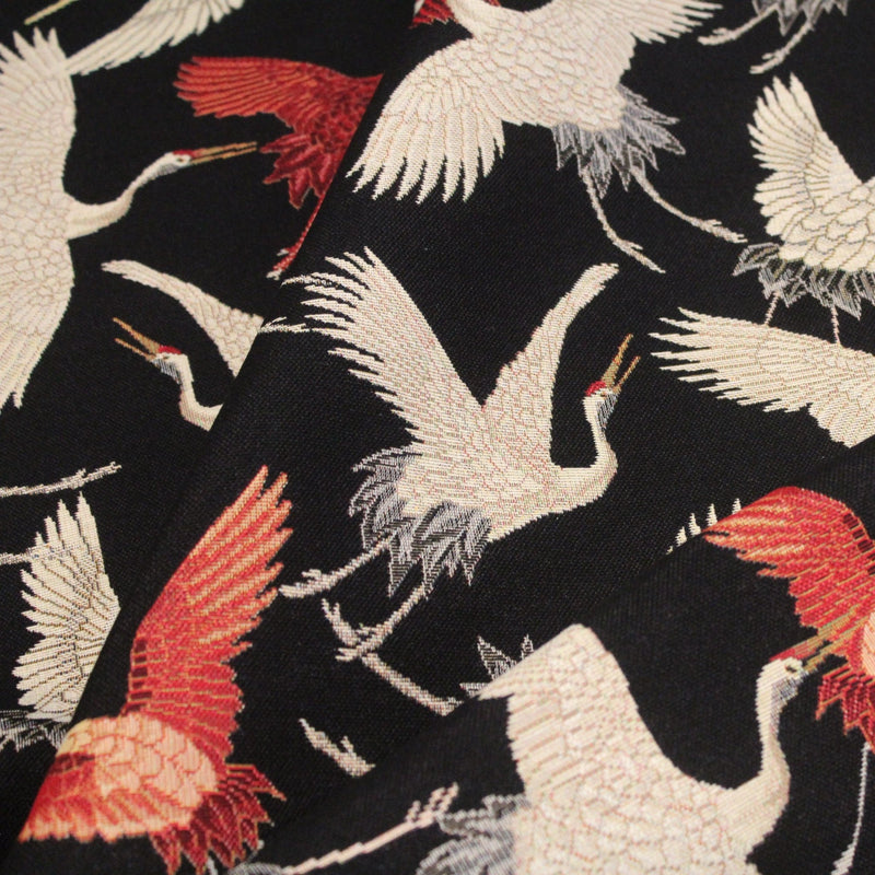 Tissu jacquard motif traditionnel japonais des grues tsuru écrues & rouges, fond noir - Oeko - Tex - tissuspipi.com